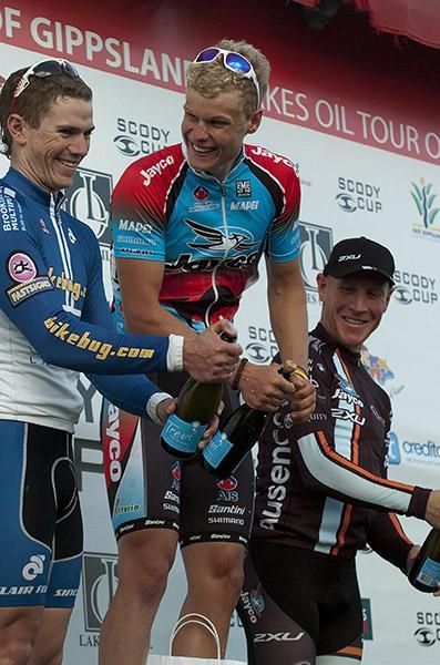 The stage eight podium (l-r): Philip Grenfell (2nd,Bikebug.com), Edward Bissaker (1st,Jayco/AIS), and Chris Jongewaard (3rd,Jayco/2XU).