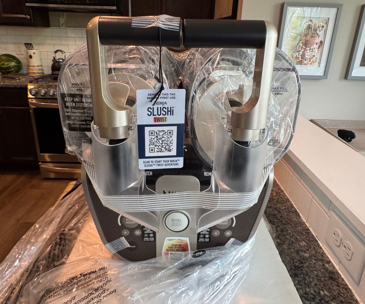 A front view of the Ninja slushi twist with the plastic packaging on