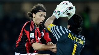 Zlatan Ibrahimovic challenges Gianluigi Buffon in a match between AC Milan and Juventus in March 2011.