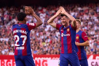 Erling Haaland Manchester City Robert Lewandowski of FC Barcelona scores the teams first goal during the LaLiga EA Sports match between Sevilla FC and FC Barcelona at Estadio Ramon Sanchez Pizjuan on May 26, 2024 in Seville, Spain. (Photo by Fran Santiago/Getty Images)