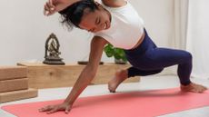 Woman practicing yoga on Yogamatters Eco Flow Yoga Mat