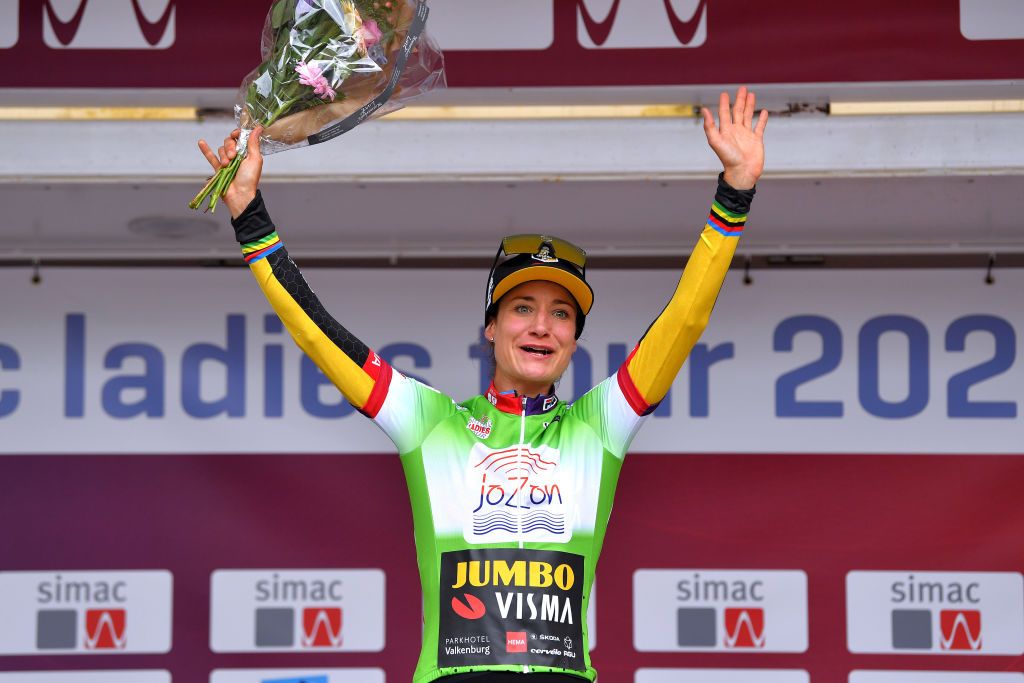 HARDENBERG NETHERLANDS AUGUST 25 Marianne Vos of Netherlands and Team Jumbo Visma celebrates winning the Green Points Jersey on the podium ceremony after the 23rd Simac Ladies Tour 2021 Stage 1 a 1344km stage from Zwolle to Hardenberg SLT2021 UCIWWT on August 25 2021 in Hardenberg Netherlands Photo by Luc ClaessenGetty Images