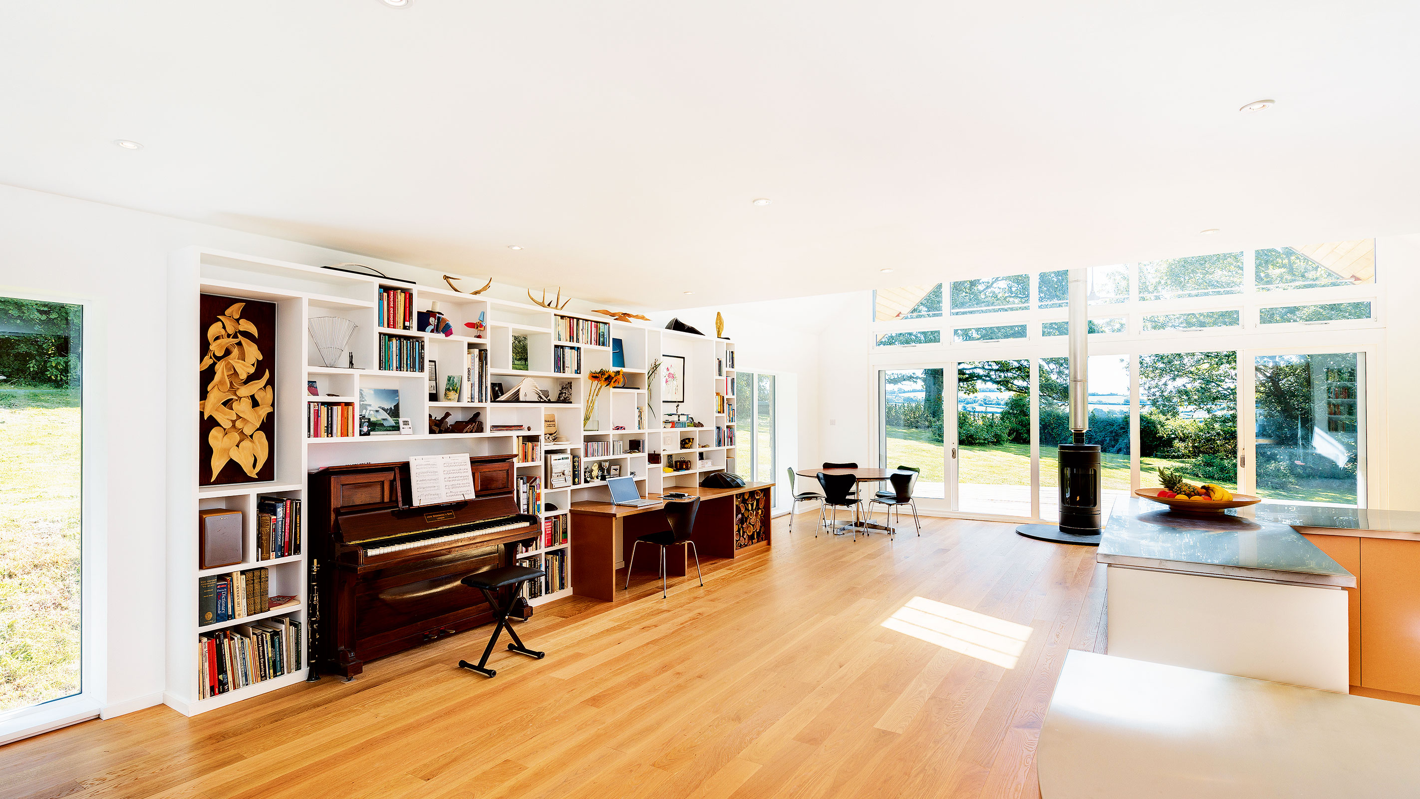 open plan kitchen living area with vaulted ceiling and glazed gable