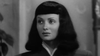 Jacqueline looking at Mary for the first time in a while in The Seventh Victim.