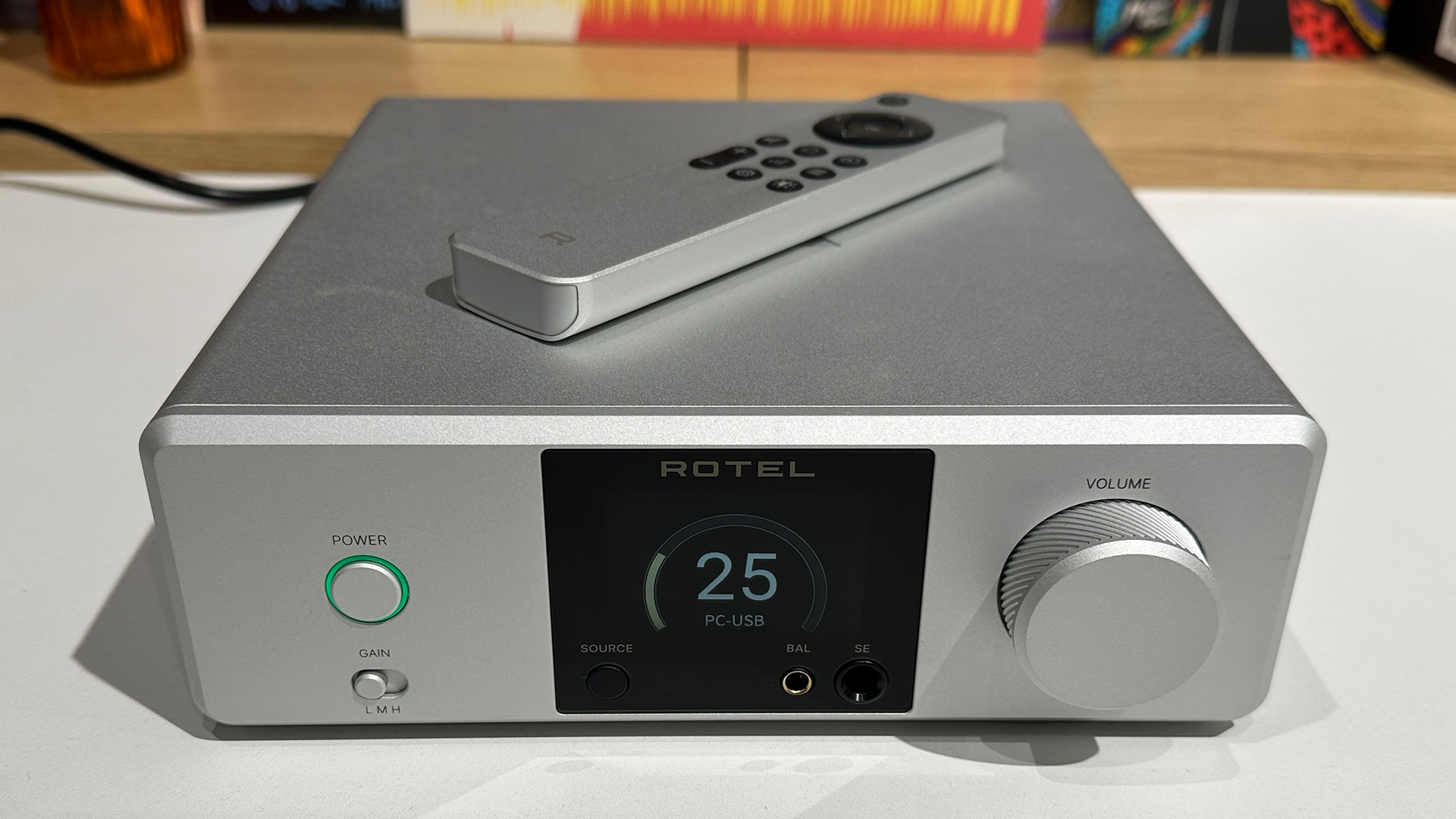 Rotel DX-3 DAC/headphone amp with remote control on top