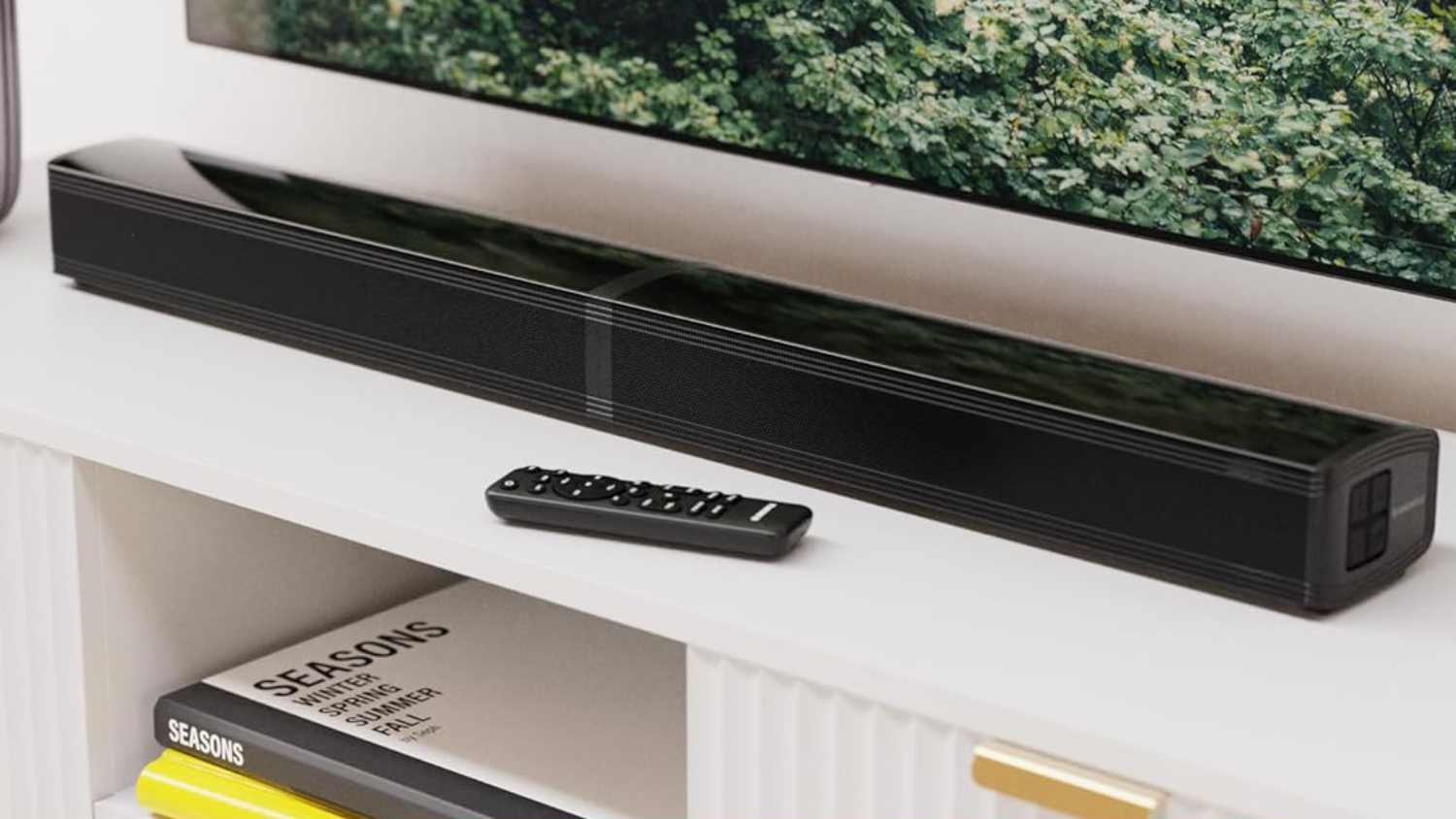 The Oakcastle SB80 on a cabinet under a TV.