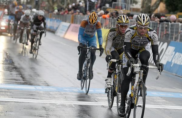 Mark Cavendish follows teammate Bernhard Eisel across the line.