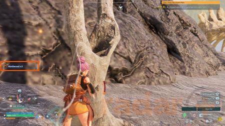 The player character chops down a tree and obtains some Palworld hardwood.