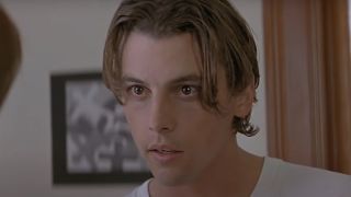 Skeet Ulrich as Billy Loomis darting his eyes at Sidney in Scream