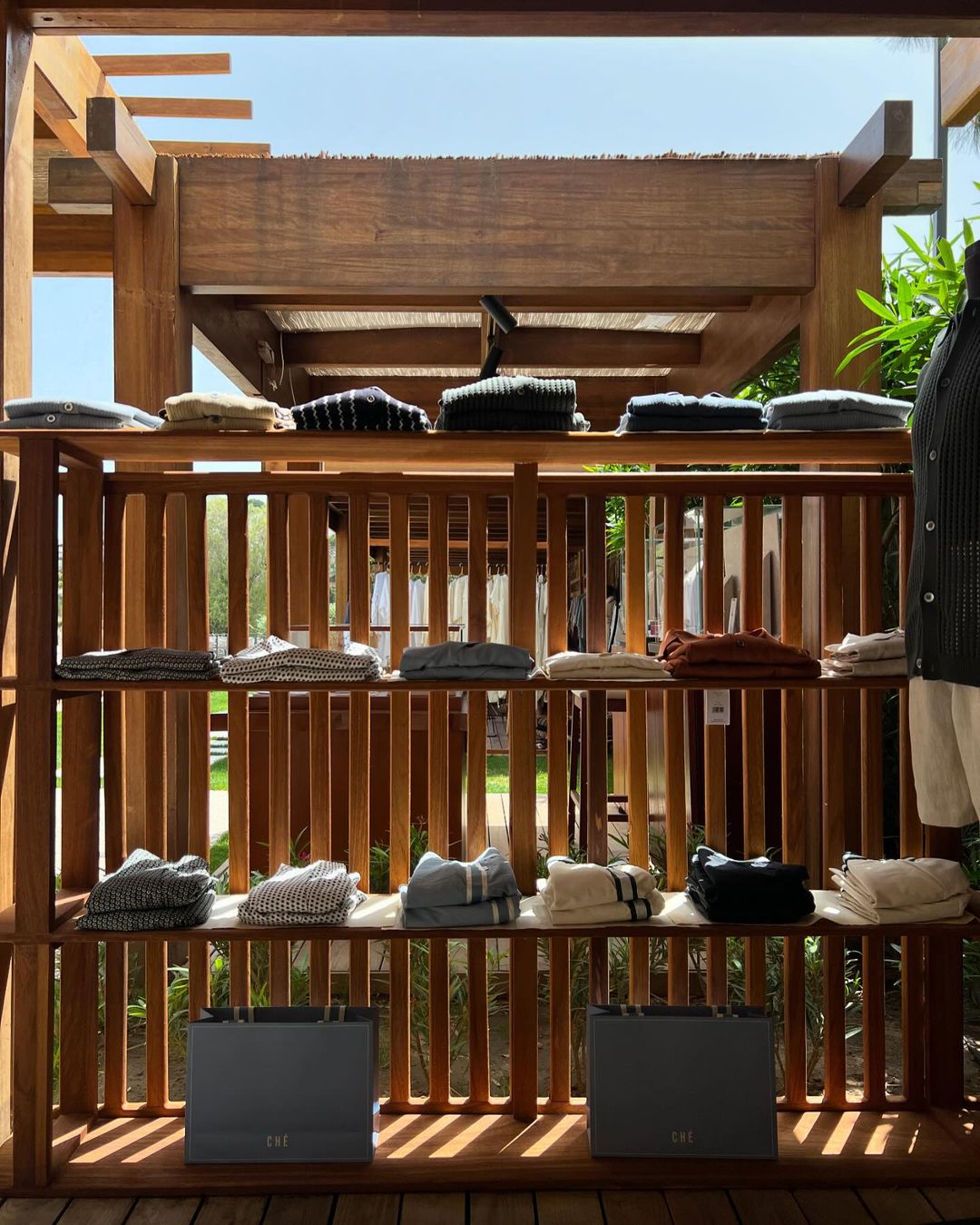 A resortwear pop-up shop is hosted in a beach-side wooden bungalow with an airy feel and plenty of natural sunlight.