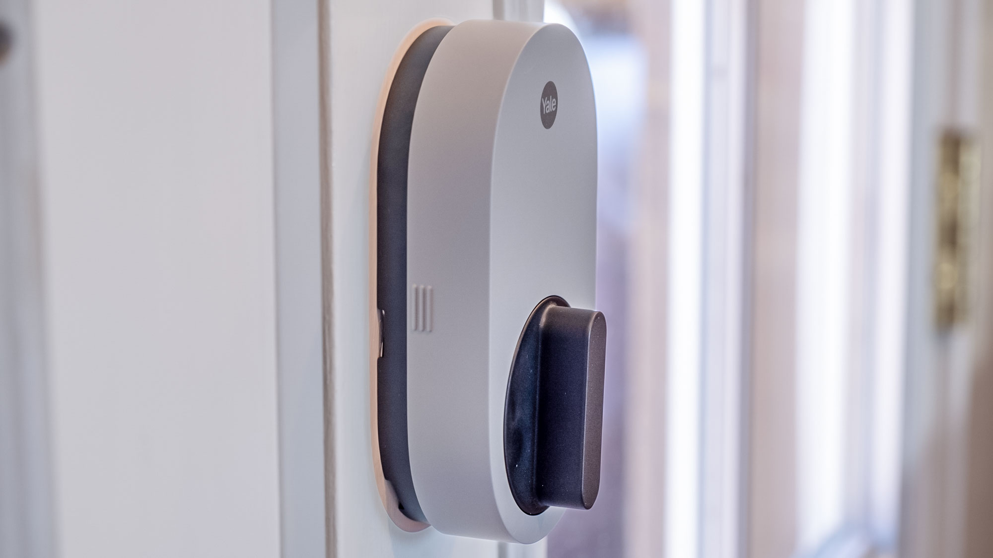 Side view of the interior side latch of a Yale Smart Lock with Matter