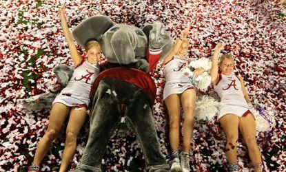 The mascot and cheerleaders of the Alabama Crimson Tide celebrate after defeating Notre Dame 42-14 to win the BCS National Championship. 