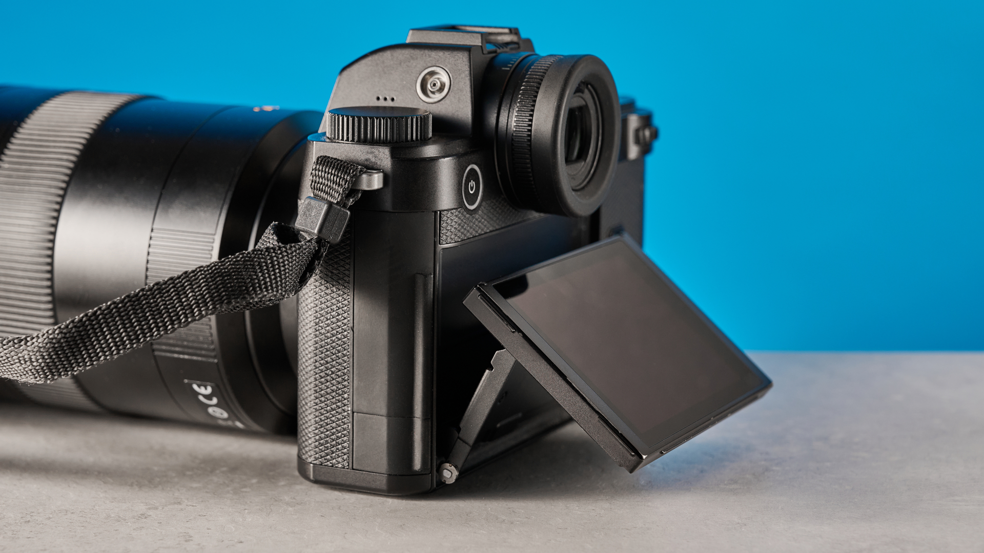 A black Leica SL3 mirrorless full frame camera