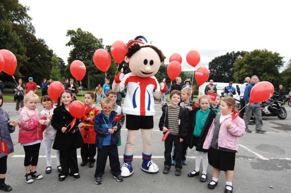 TOBI, the Tour of Britain mascot, hangs out with his pals.
