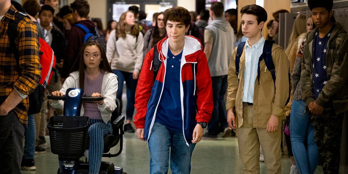 Nasim Pedrad dressed as 14-year-old Chad in the high school hallway