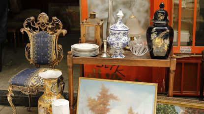A table displaying antique and vintage home decor