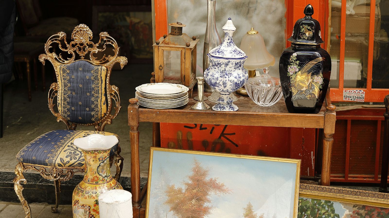 A table displaying antique and vintage home decor