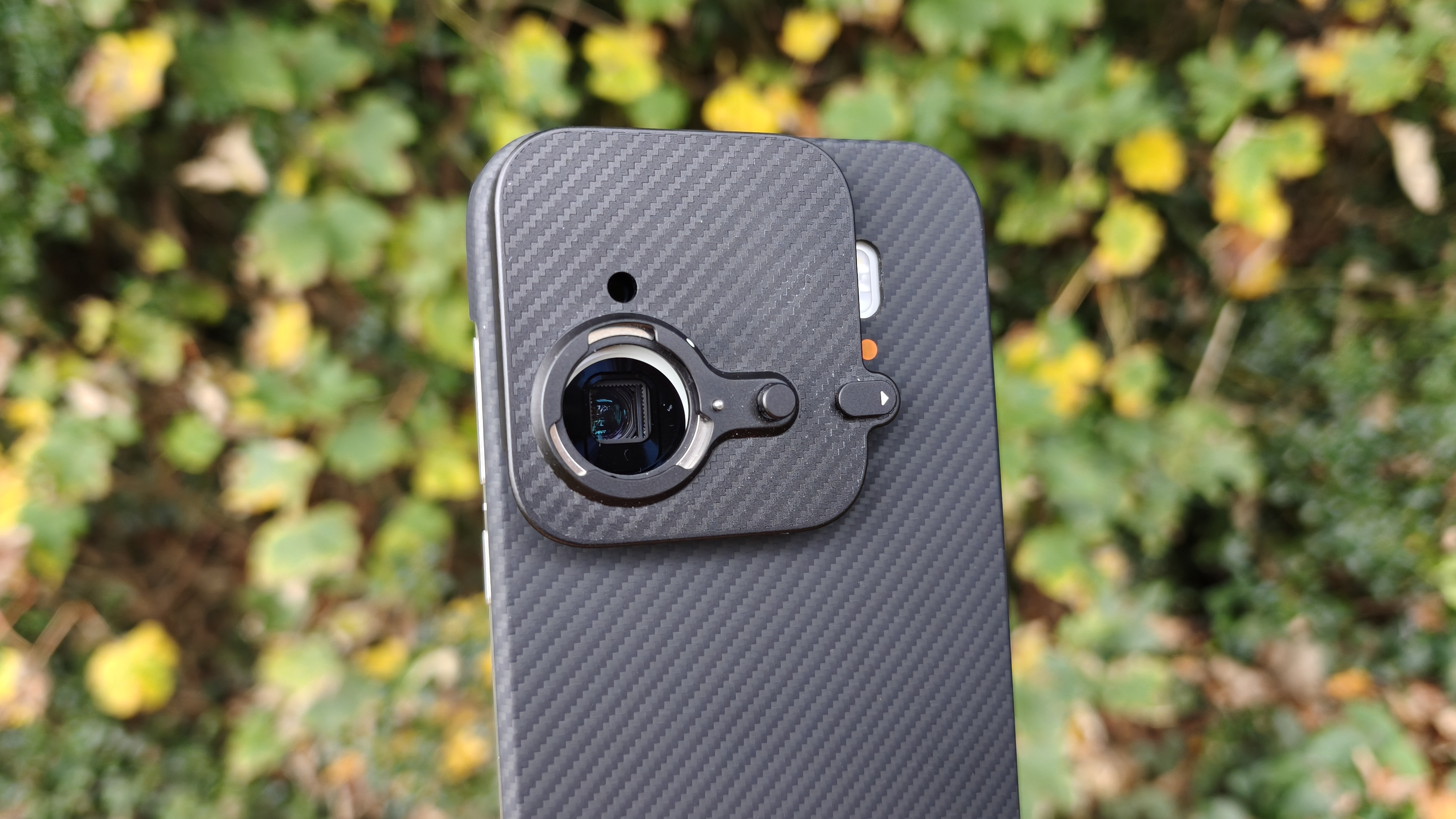 Oppo Find X9 Pro with the extender lens mount attached
