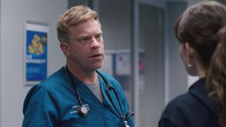 Dylan Keogh talking to Jodie in Casualty. 