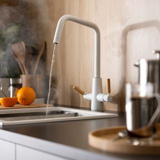 White boiling water tap with wood details
