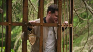 Derrick Levasseur in a cage in The Traitors.