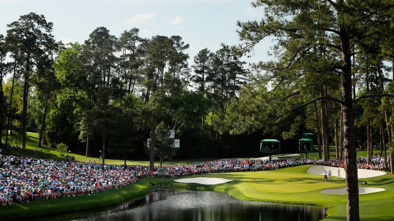 The crowd watch the action at the 16th green during the 2019 Masters