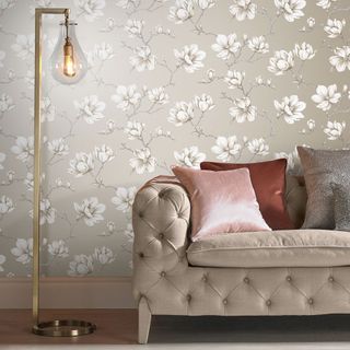 living room with Pierre graham brown wallpaper and sofa