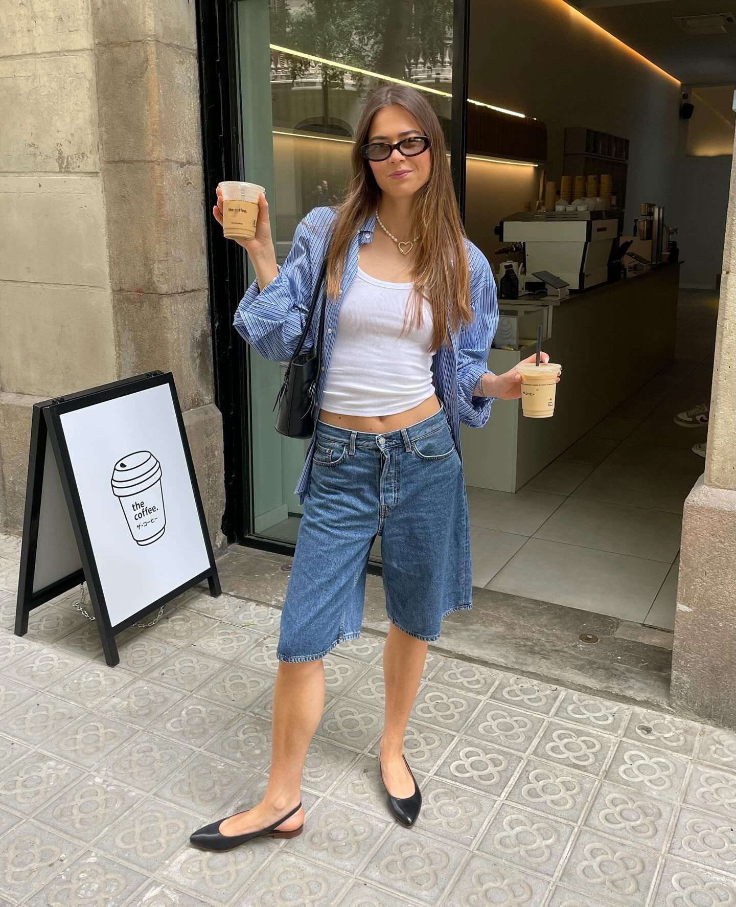 Woman in long jorts with flats