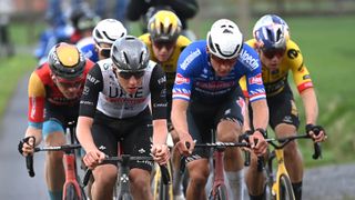 Matej Mohorič of Slovenia and Team Bahrain - Victorious, Tadej Pogačar of Slovenia and UAE Team Emirates, Mathieu Van Der Poel of The Netherlands and Team Alpecin-Deceuninck and Wout Van Aert of Belgium and Team Jumbo-Visma compete in the breakaway