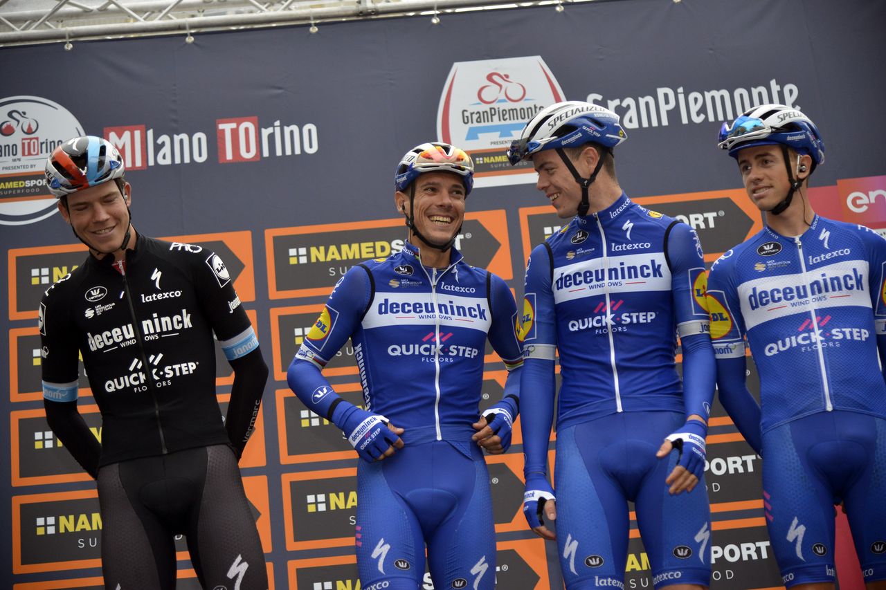 Philippe Gilbert (Deceuninck-Quickstep) shares a laugh on stage at the start of Milano-Torino