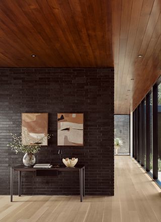 A hallway with varied wood accents