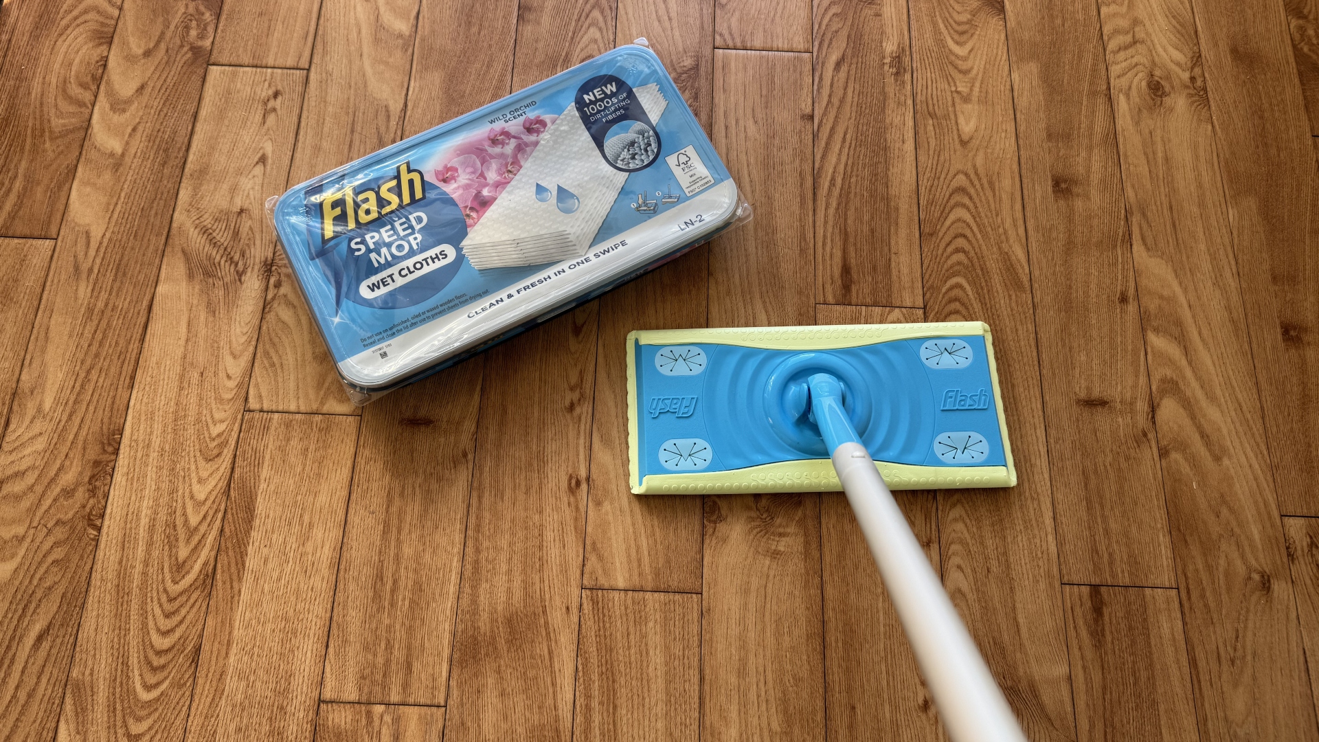 The Flash Speed Mop next to a packet of wipes