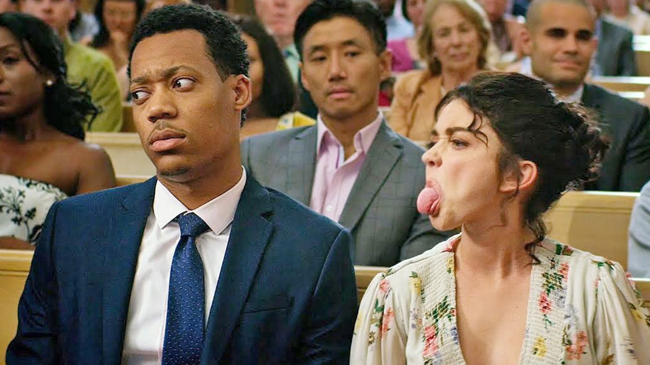 Tyler James Williams and Sarah Hyland in The Wedding Year