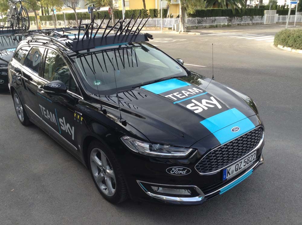 The Ford team cars are decorated with Team Sky's blue stripe