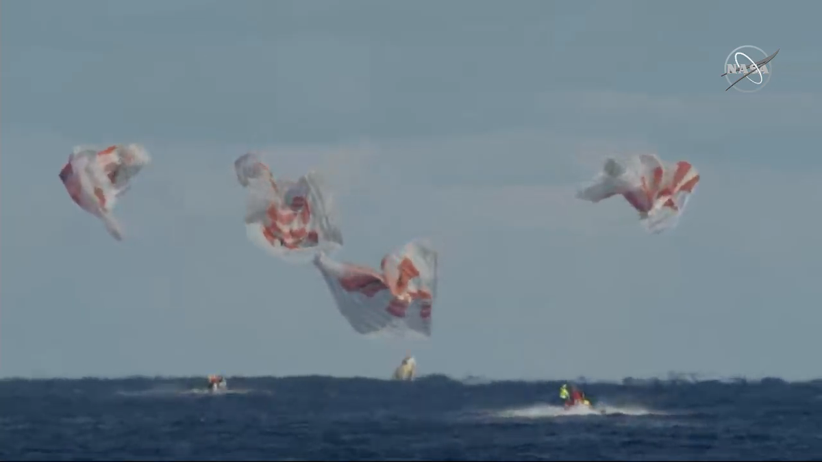 SpaceX's first Crew Dragon capsule splashes down in the Atlantic Ocean on March 8, 2019, ending its uncrewed first test flight to the International Space Station.