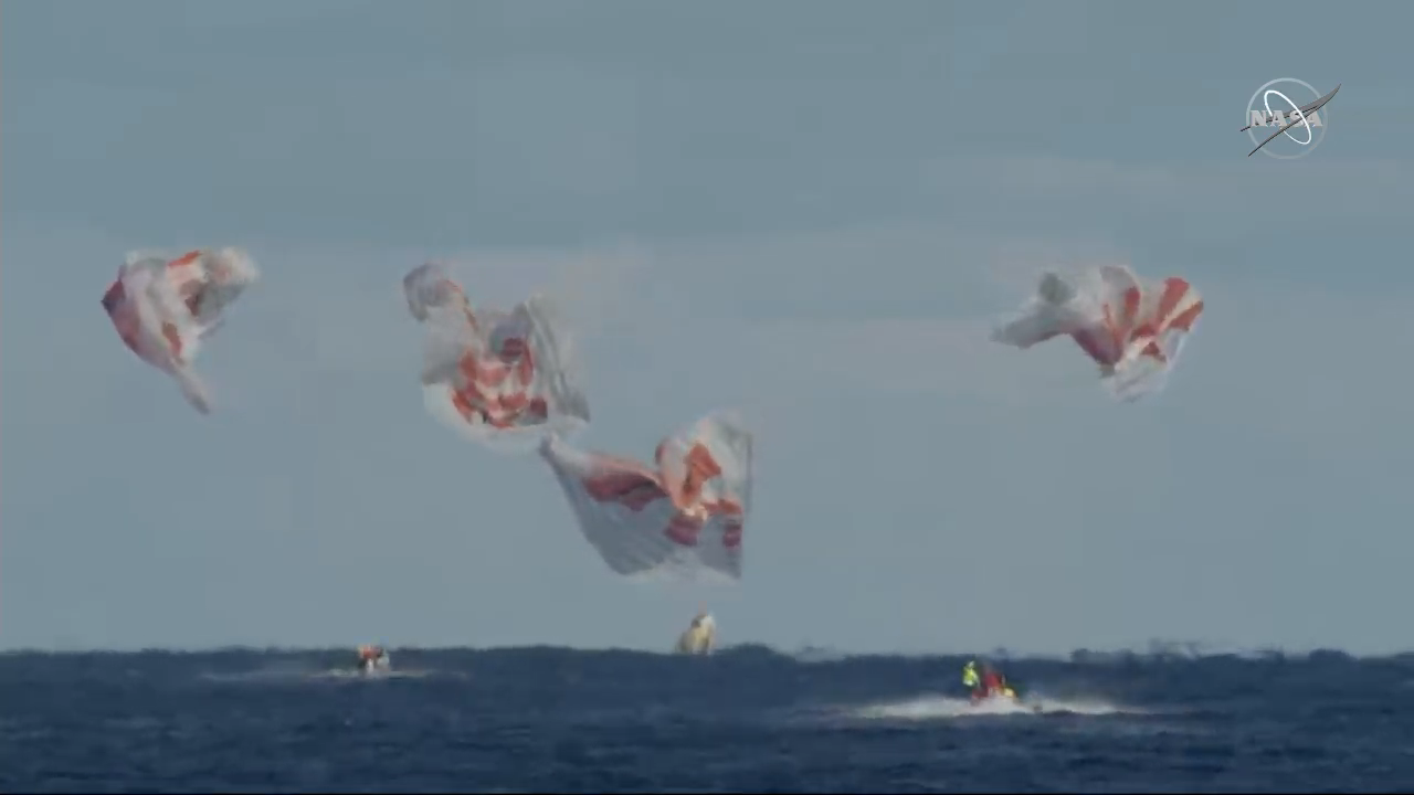 SpaceX's first Crew Dragon capsule splashes down in the Atlantic Ocean on March 8, 2019, ending its uncrewed first test flight to the International Space Station.