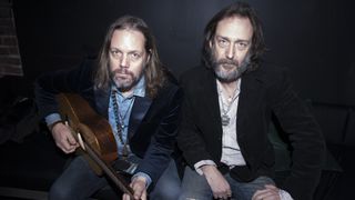 Portrait of American sibling musicians Rich and Chris Robinson, of the group the Black Crowes, as they pose backstage at Lincoln Hall, Chicago, Illinois, February 27, 2020.
