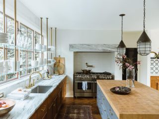 kitchen with marble countertops and wood cabinets