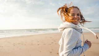 Is running good for you? Image shows runner on the beach