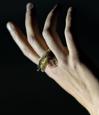gold ring on hand