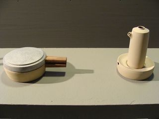 Kettle and lidded pan in neutral tones