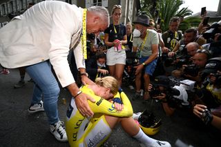 An exhausted and emotional Demi Vollering (SD Worx) after winning one of the rare women's races that attracts the full media spotlight, the Tour de France Femmes