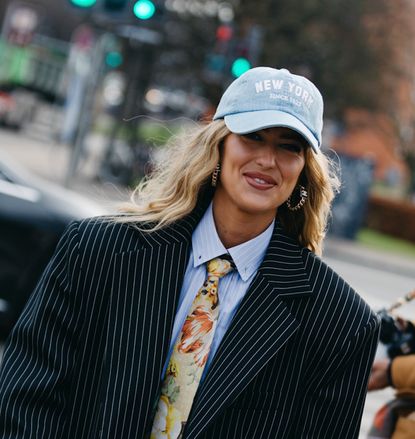 woman wearing a baseball cap 