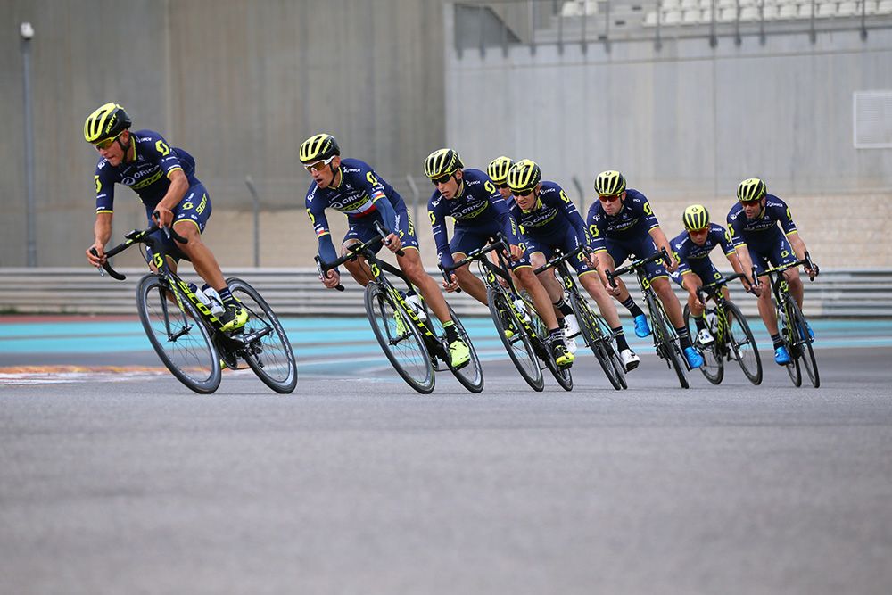 The Orica-Scott team ride at speed