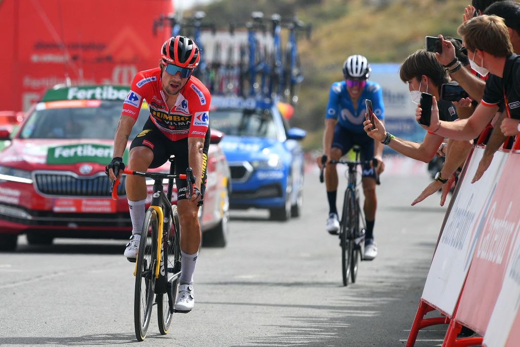 Primož Roglič (Jumbo-Visma) crosses the finish of stage 9 ahead of Enric Mas (Movistar)