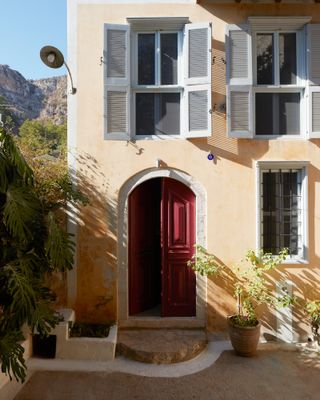 Traditional Greek house in Kastellorizo with red door