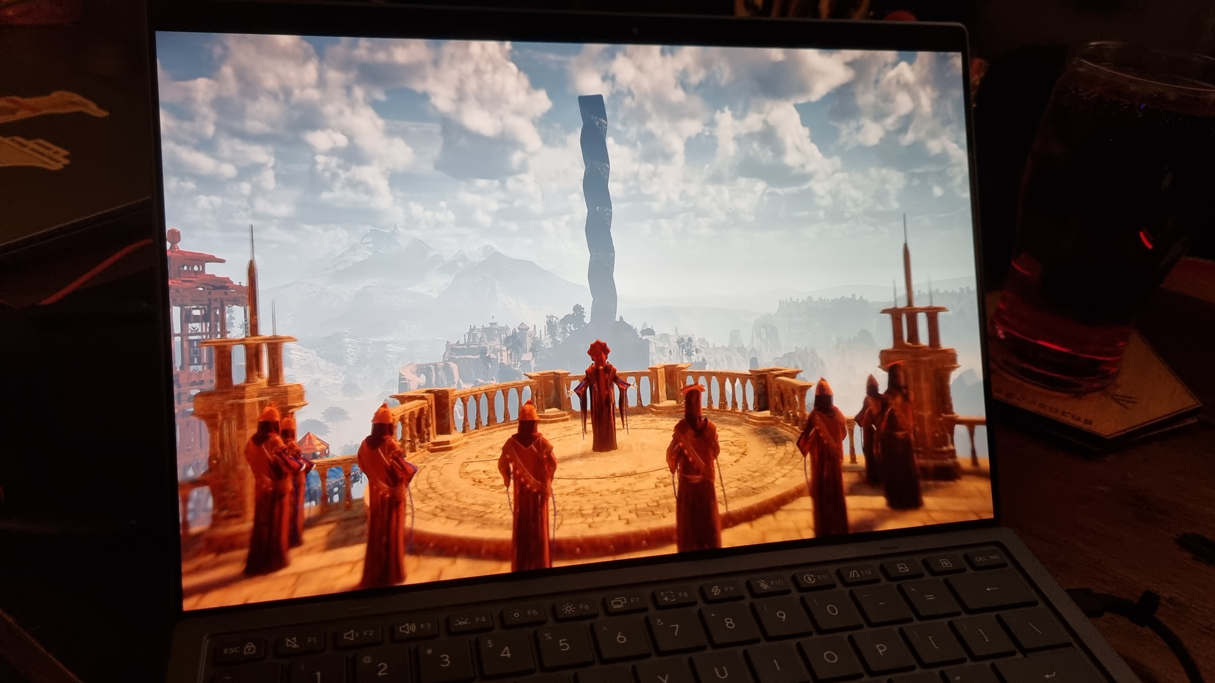 A gaming laptop running the Horizon Zero Dawn benchmark