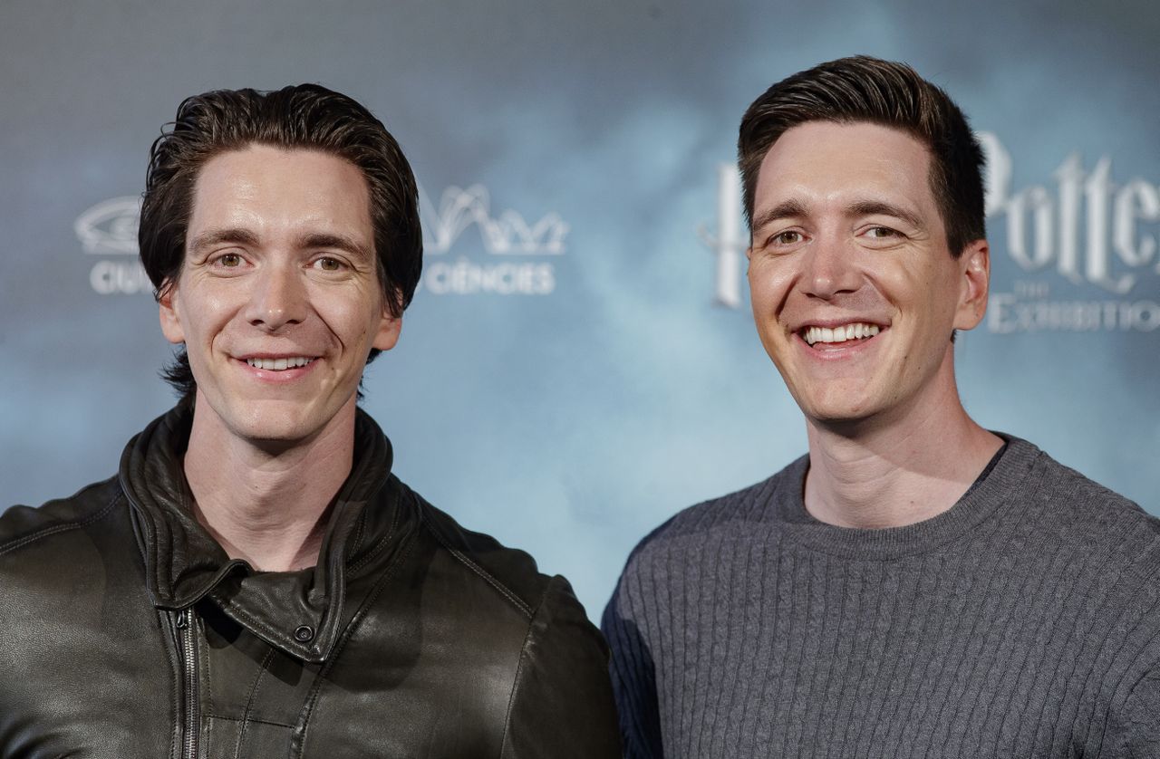 James Phelps and Oliver Phelps attend the "Harry Potter: the Exhibition" opening in Madrid 2019