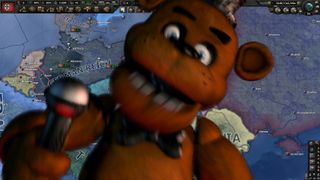 Freddy Fazbear screams at the player over a game of Hearts of Iron 4.