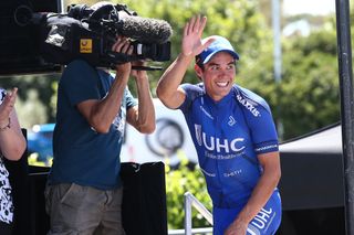 UHC's Travis McCabe waves from the podium